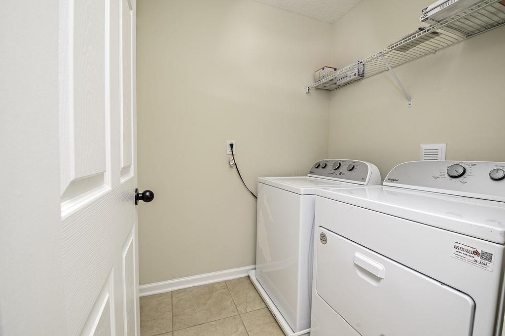 41 Nelson Lane St. Johns, FL 32259 - Photo 29 of 34 a utility room with dryer and washer