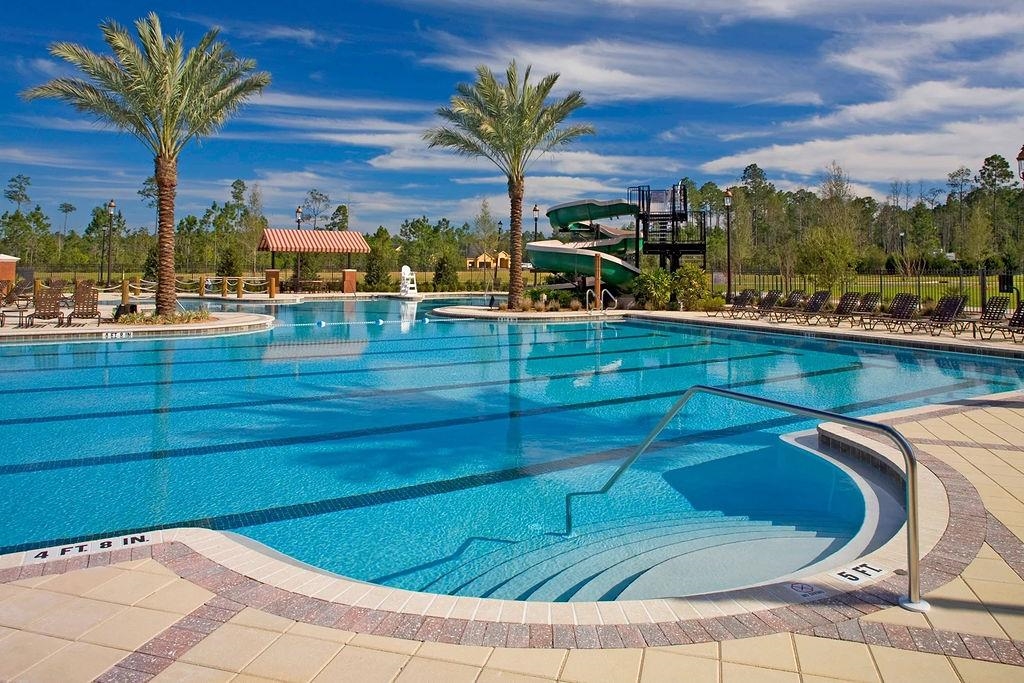 41 Nelson Lane St. Johns, FL 32259 - Photo 33 of 34 a view of a swimming pool with a lounge chair