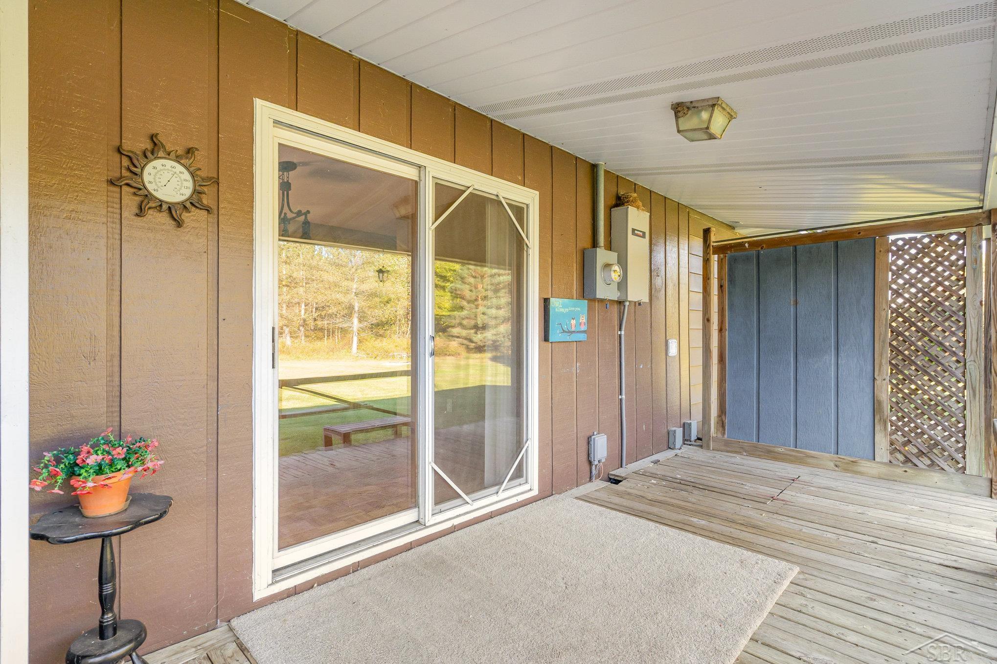13245 Gasper Road St. Charles, MI 48655 - Photo 20 of 28 Covered Deck