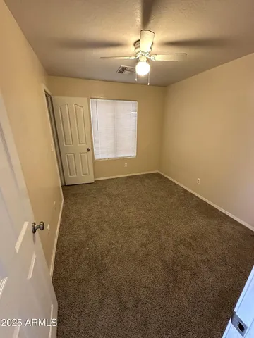 en view of a livingroom with a staircase