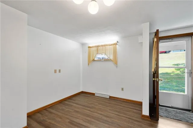 a bathroom with a sink a mirror and a toilet