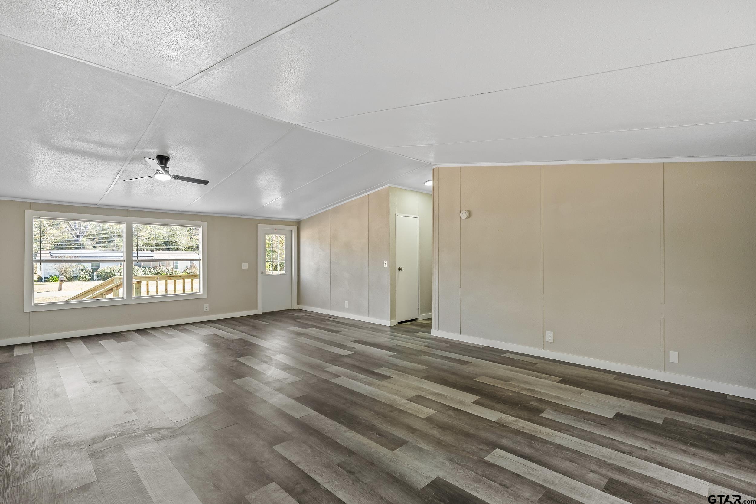 1121 Pecan Ridge Chandler, TX 75758 - Photo 12 of 26 a view of an empty room with a window