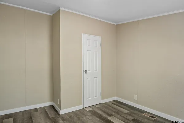a view of small space with wooden floor