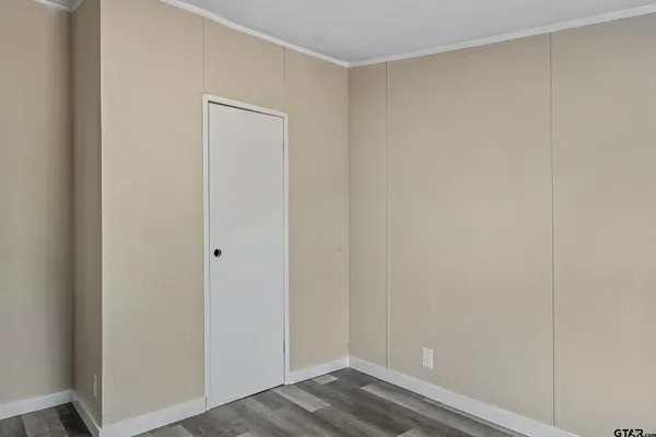 a view of small space with wooden floor