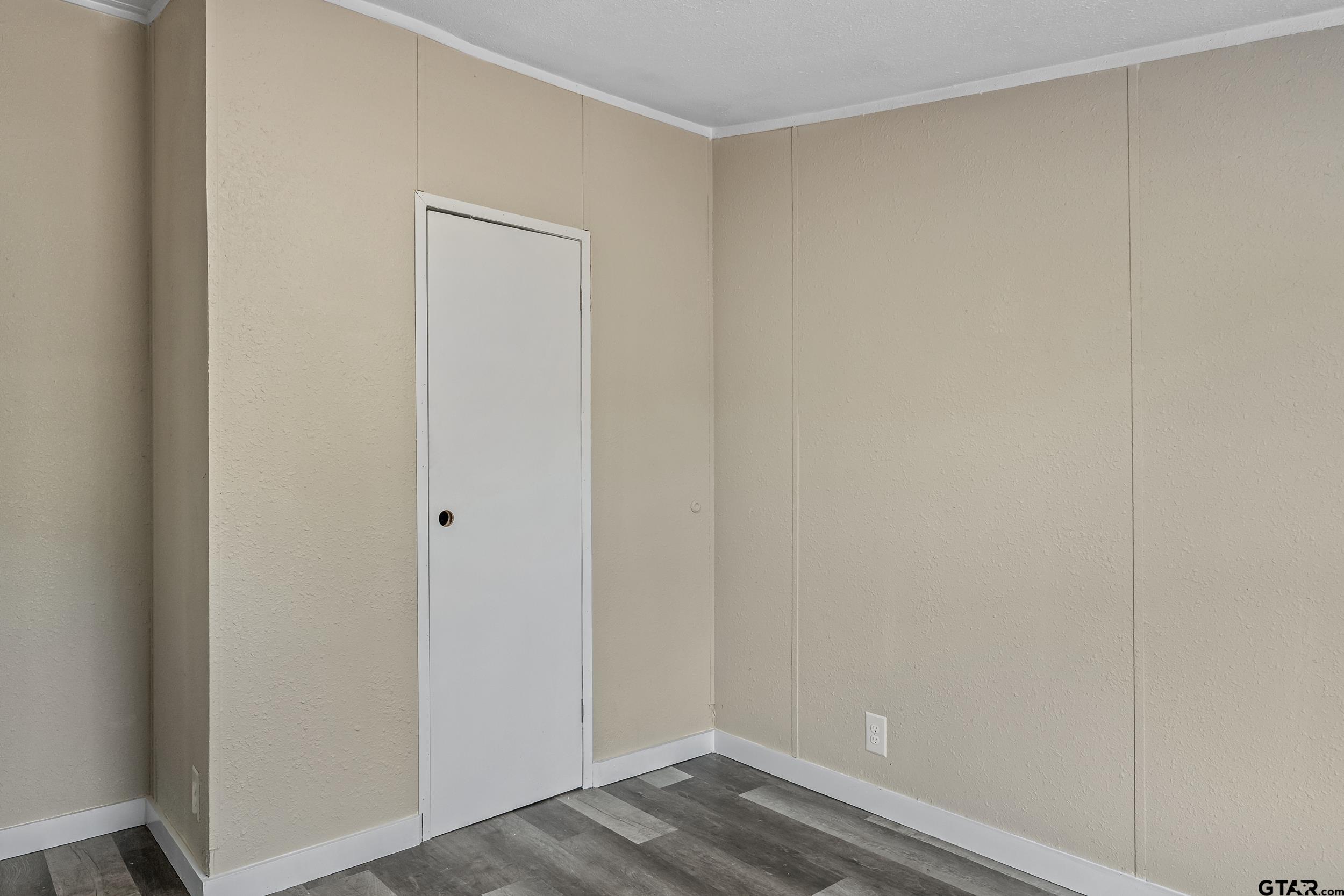 1121 Pecan Ridge Chandler, TX 75758 - Photo 22 of 26 a view of small space with wooden floor