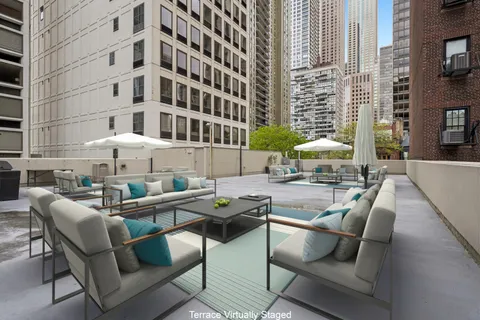 a view of a patio with open kitchen