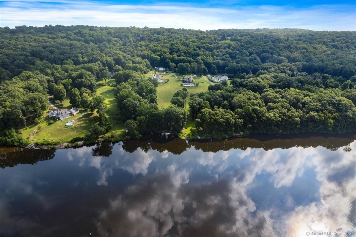 195 A Injun Hollow Road Haddam, CT 06424 - Photo 3 of 15 a view of a lake with a mountain in the background