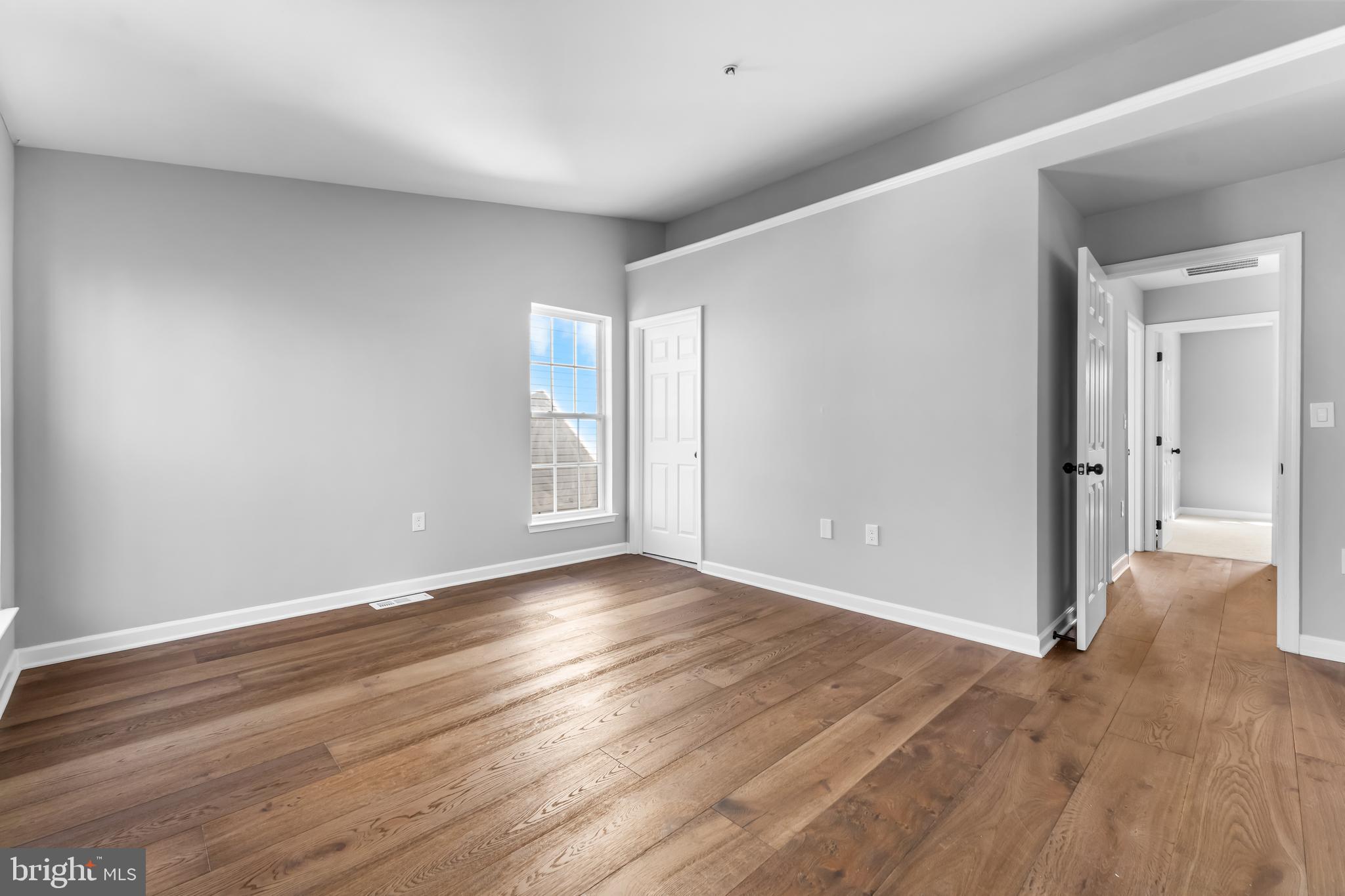 149 58th Street Southeast Washington, DC 20019 - Photo 12 of 32 wooden floor in an empty room