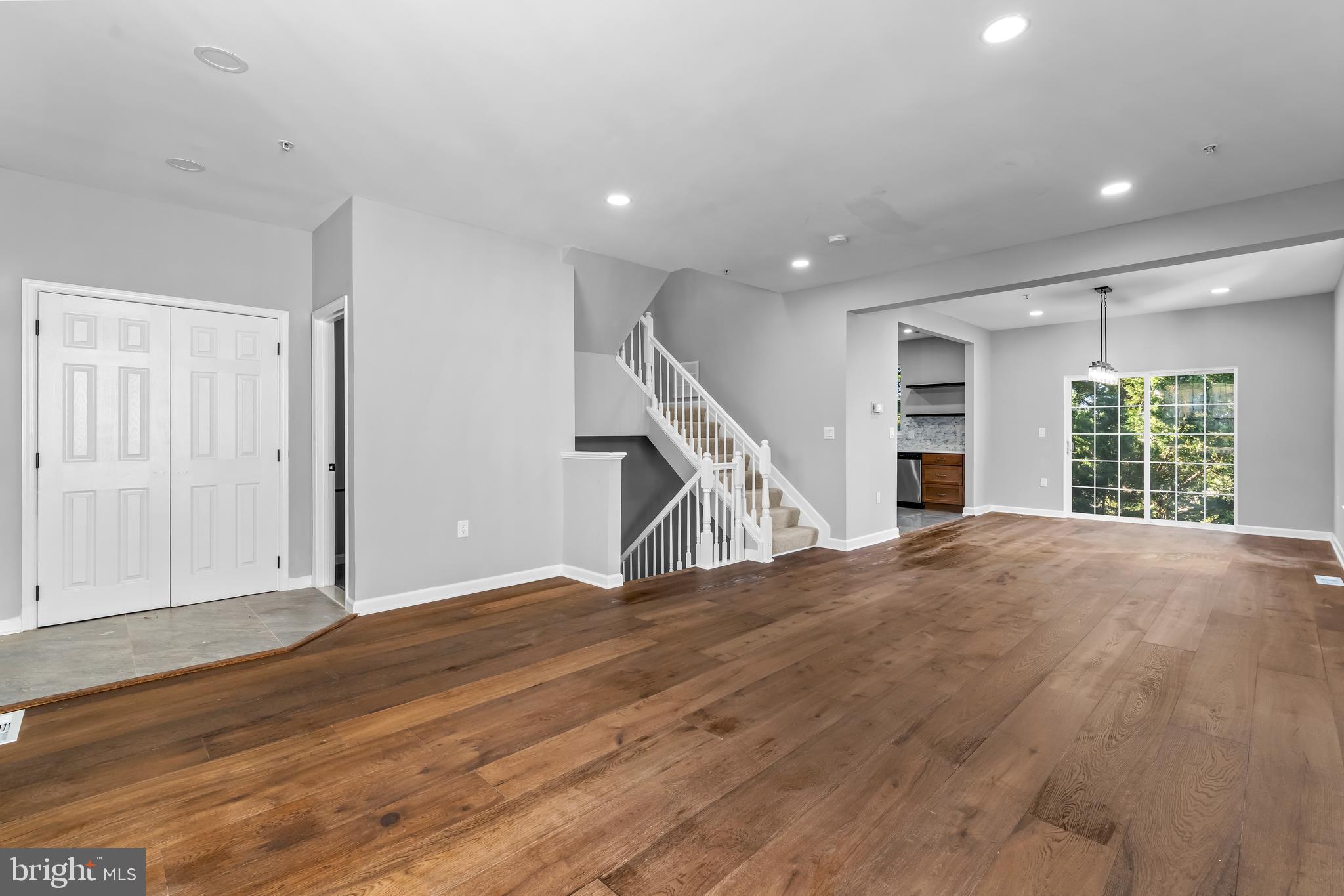 149 58th Street Southeast Washington, DC 20019 - Photo 21 of 32 a view of empty room with wooden floor and stairs