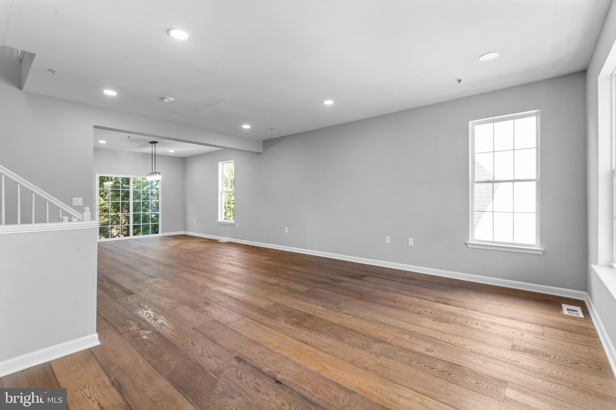 149 58th Street Southeast Washington, DC 20019 - Photo 26 of 32 an empty room with wooden floor and windows