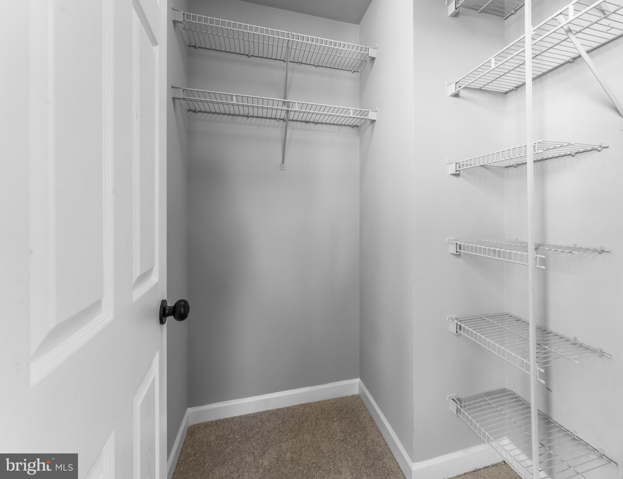 149 58th Street Southeast Washington, DC 20019 - Photo 10 of 32 a view of a room with racks on the wall
