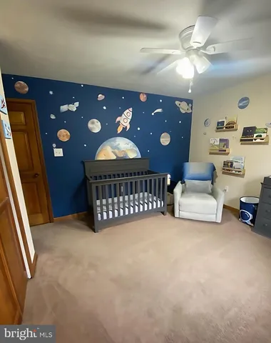 a view of livingroom with furniture and chandelier