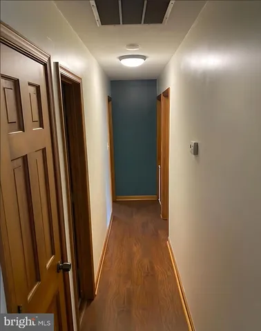 a view of hallway with stairs