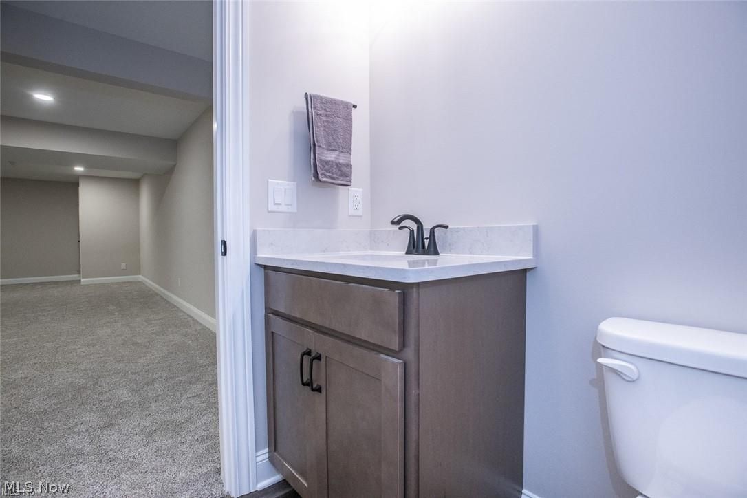 34286 Brookside Lane North Ridgeville, OH 44039 - Photo 49 of 50 Bathroom featuring vanity, recessed lighting, and dark colored carpet