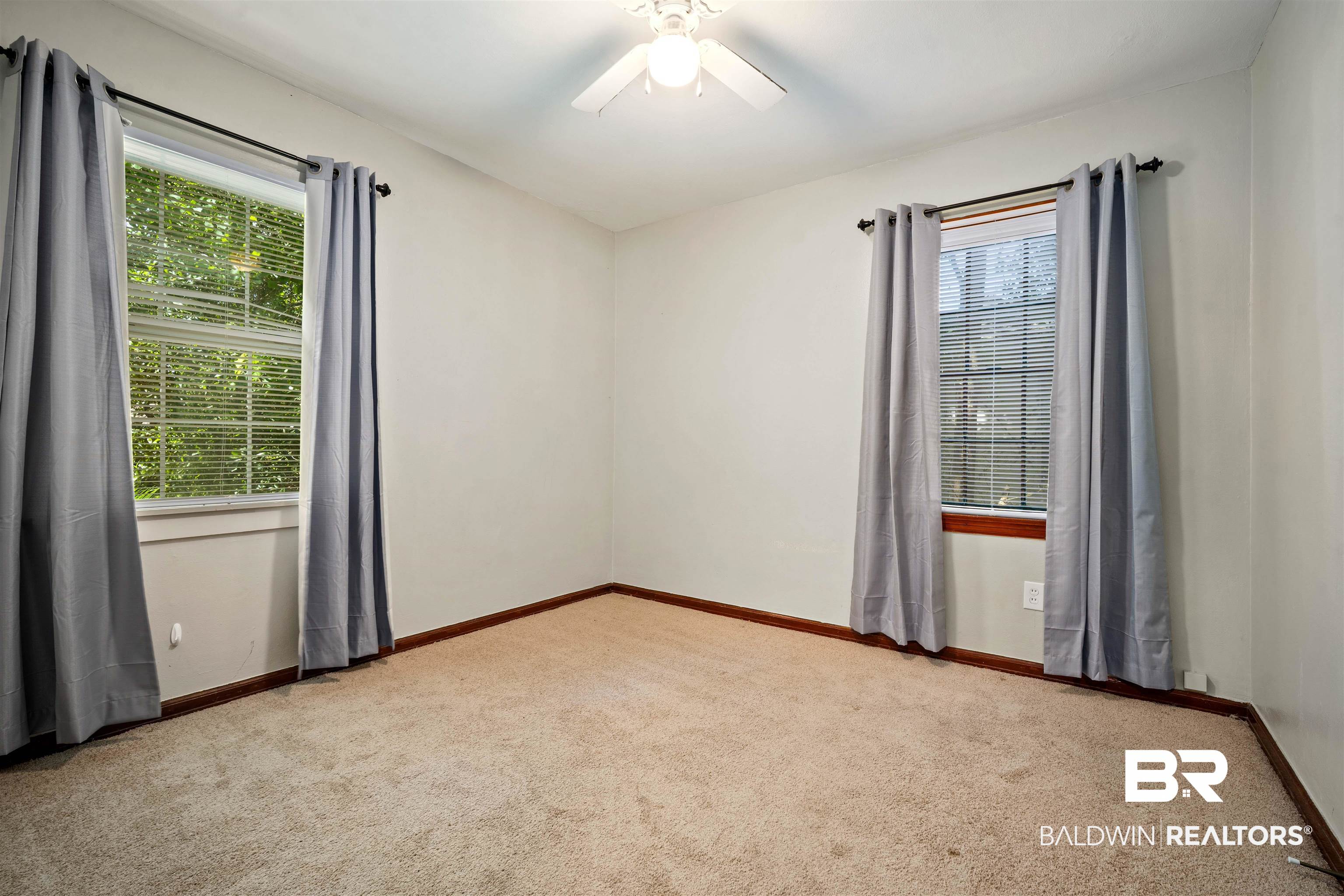 9 Elizabeth Avenue Mobile, AL 36611 - Photo 14 of 19 Spare room with carpet flooring and a ceiling fan