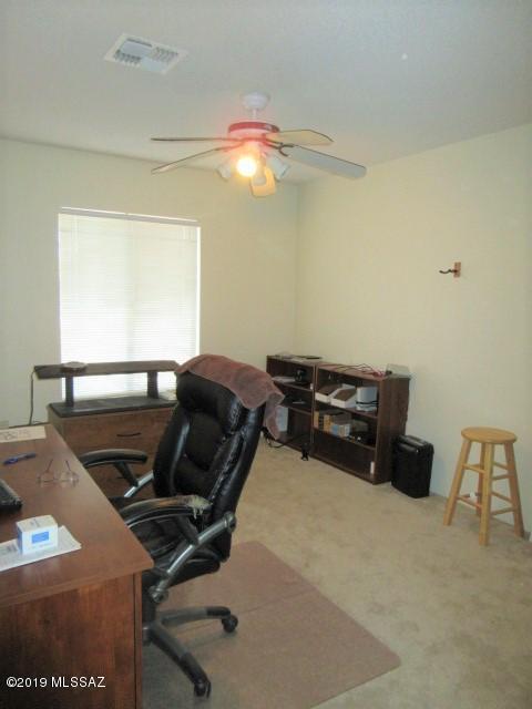 1022 Via Independencia Rio Rico, AZ 85648 - Photo 25 of 41 a living room with furniture