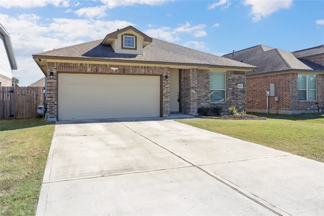 a front view of house with yard
