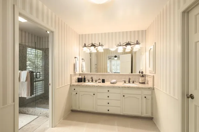 a view of a chairs and table in a patio