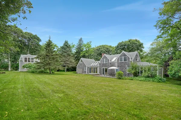 a view of a house with a big yard