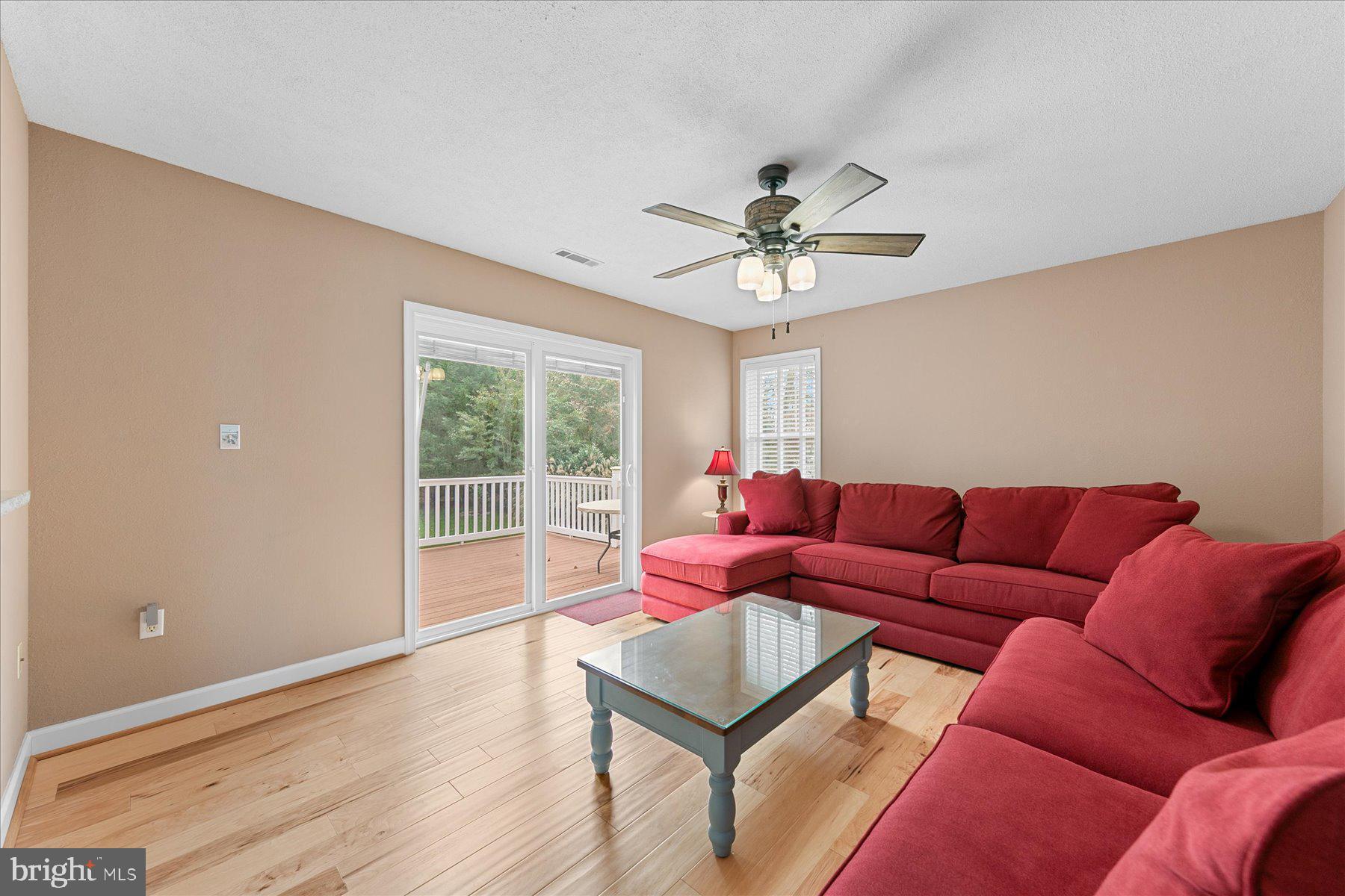 11 Amanda's Court Ocean View, DE 19970 - Photo 17 of 42 a living room with furniture and a large window