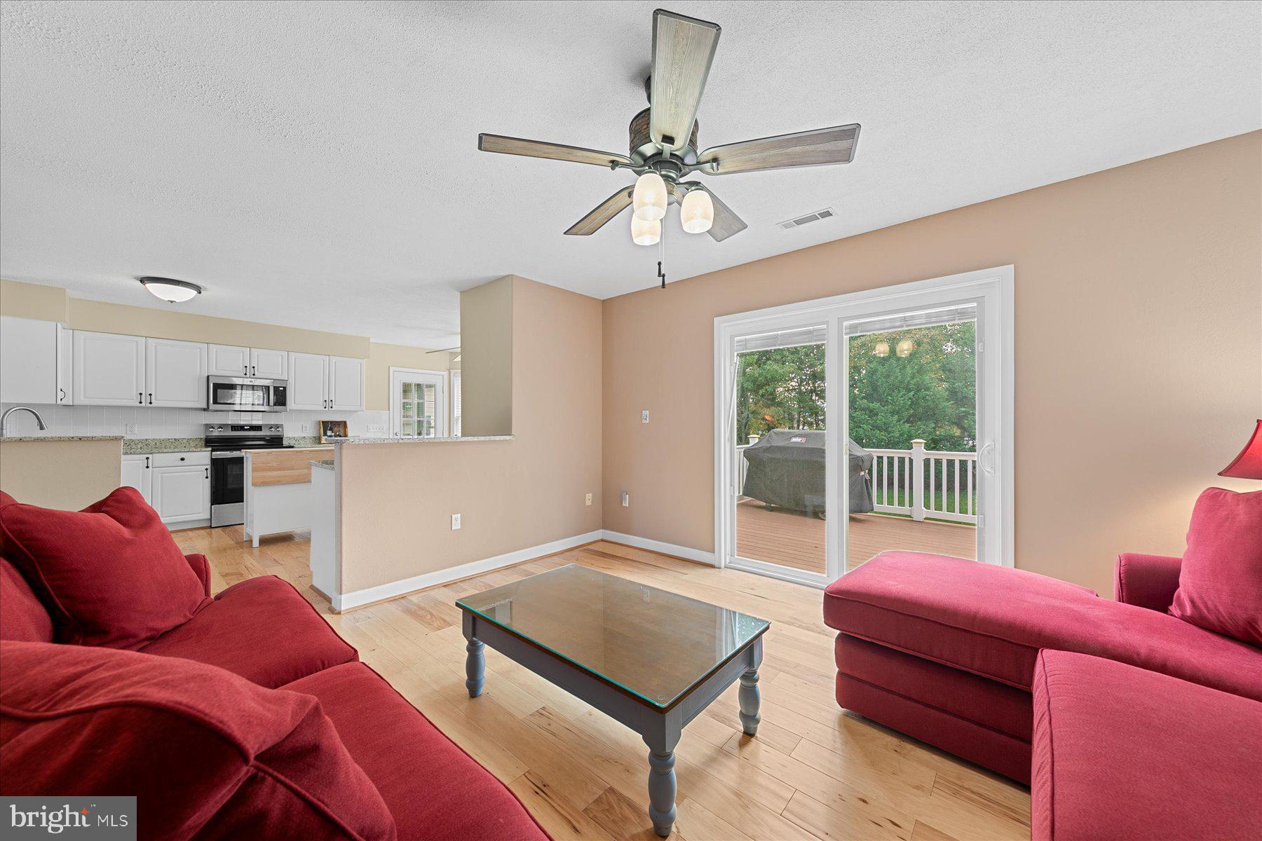 11 Amanda's Court Ocean View, DE 19970 - Photo 19 of 42 a living room with furniture and a large window
