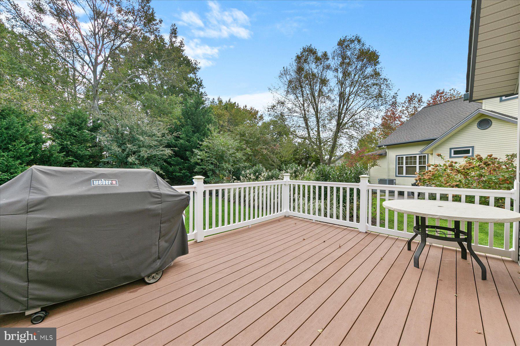 11 Amanda's Court Ocean View, DE 19970 - Photo 25 of 42 a balcony with wooden floor and furniture