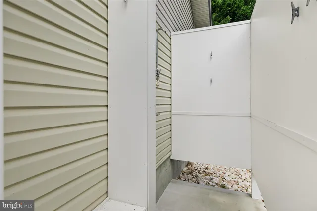 a view of house with backyard and garden