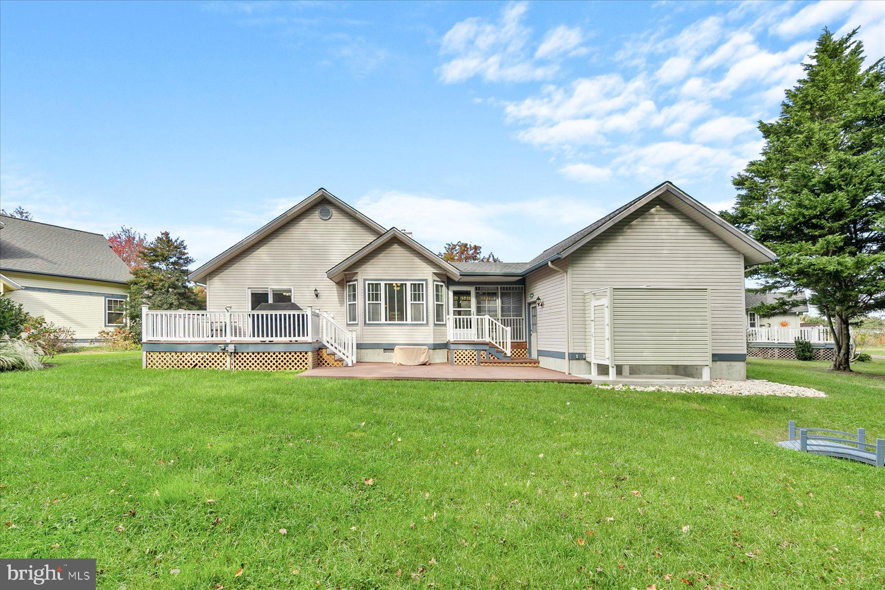 11 Amanda's Court Ocean View, DE 19970 - Photo 37 of 42 a view of a house with a yard and sitting area