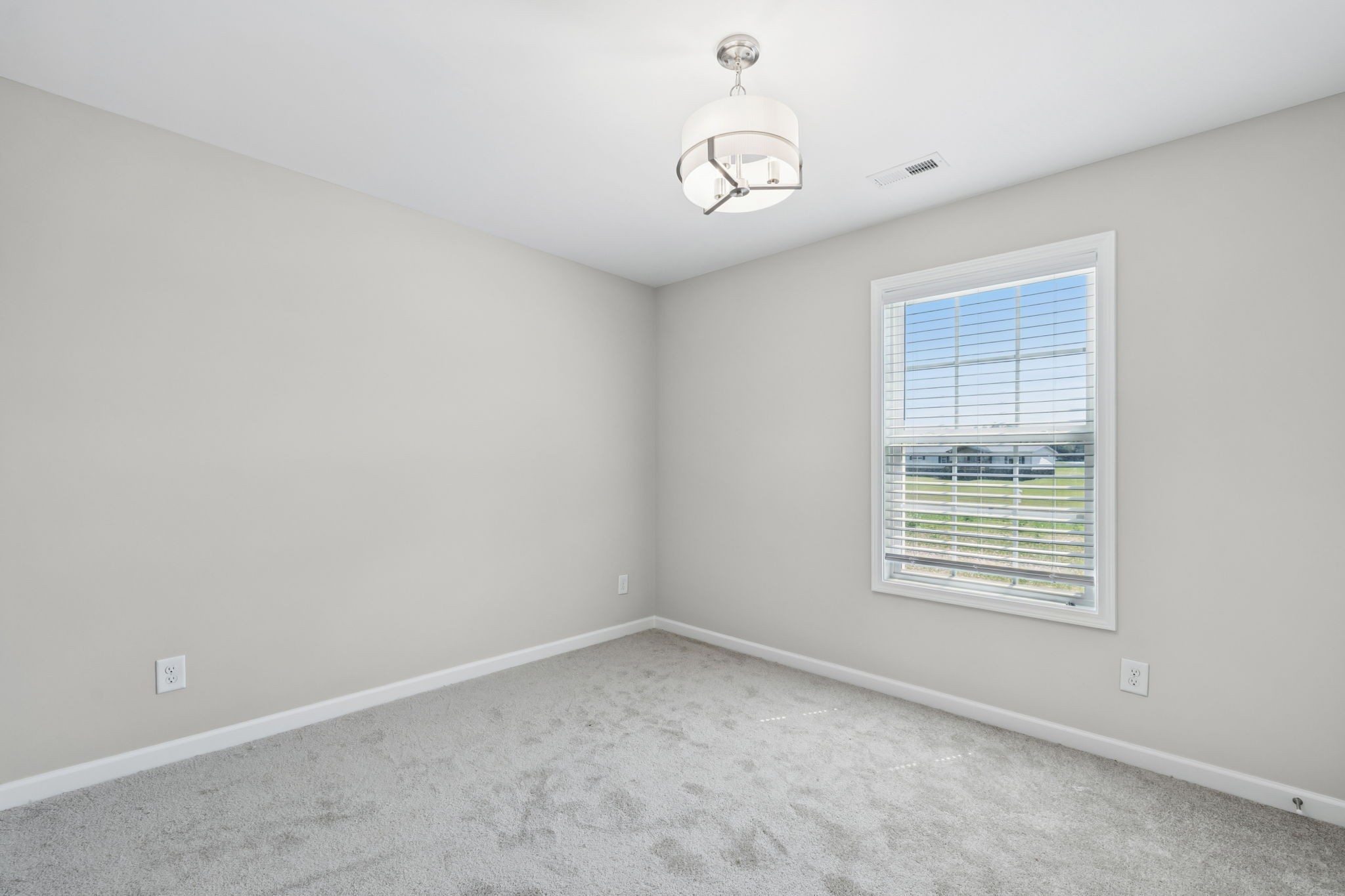 84 Old Brick Church Road Estill Springs, TN 37330 - Photo 21 of 37 an empty room with a window
