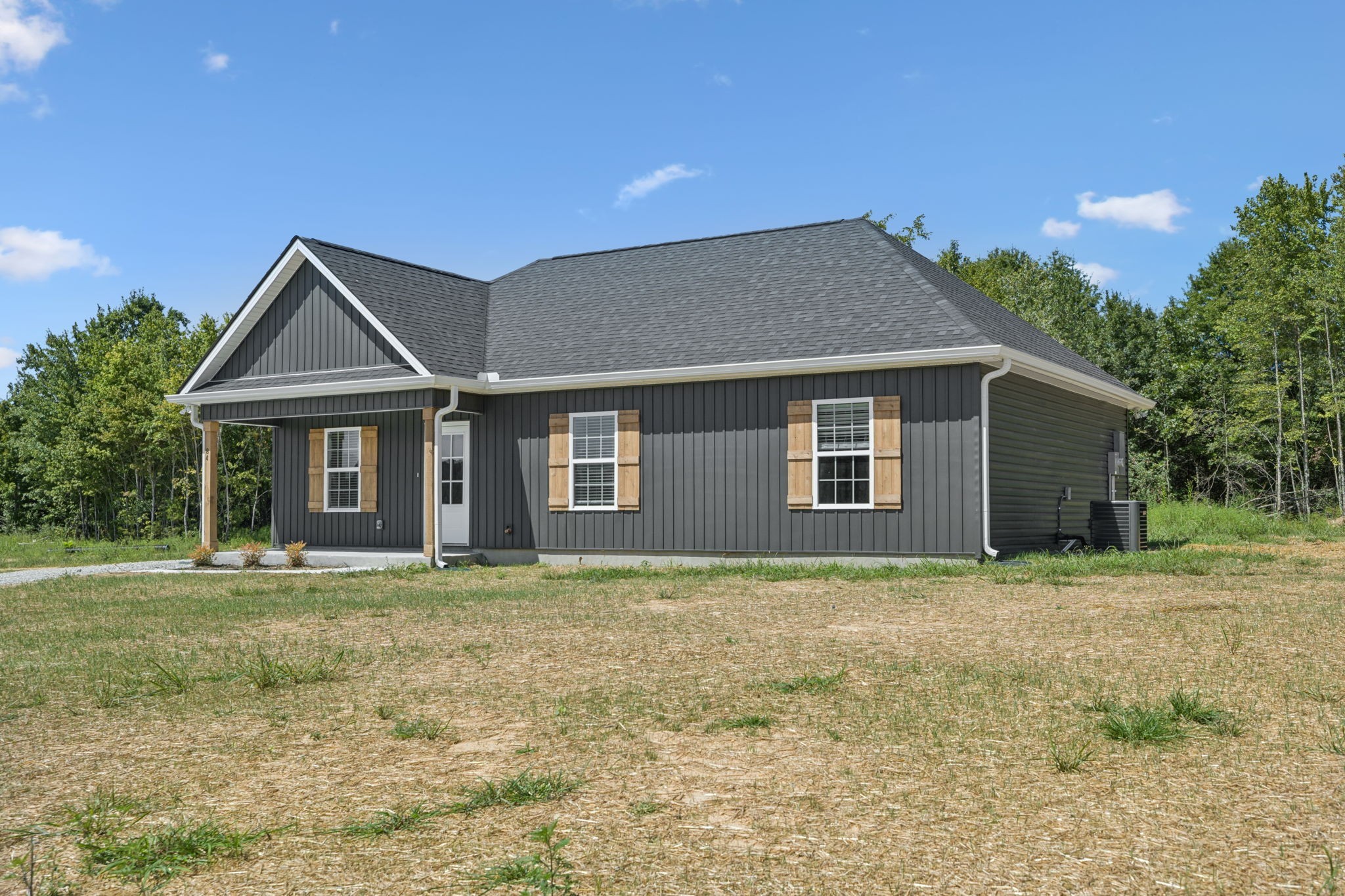 84 Old Brick Church Road Estill Springs, TN 37330 - Photo 3 of 37 a house with yard in front of it