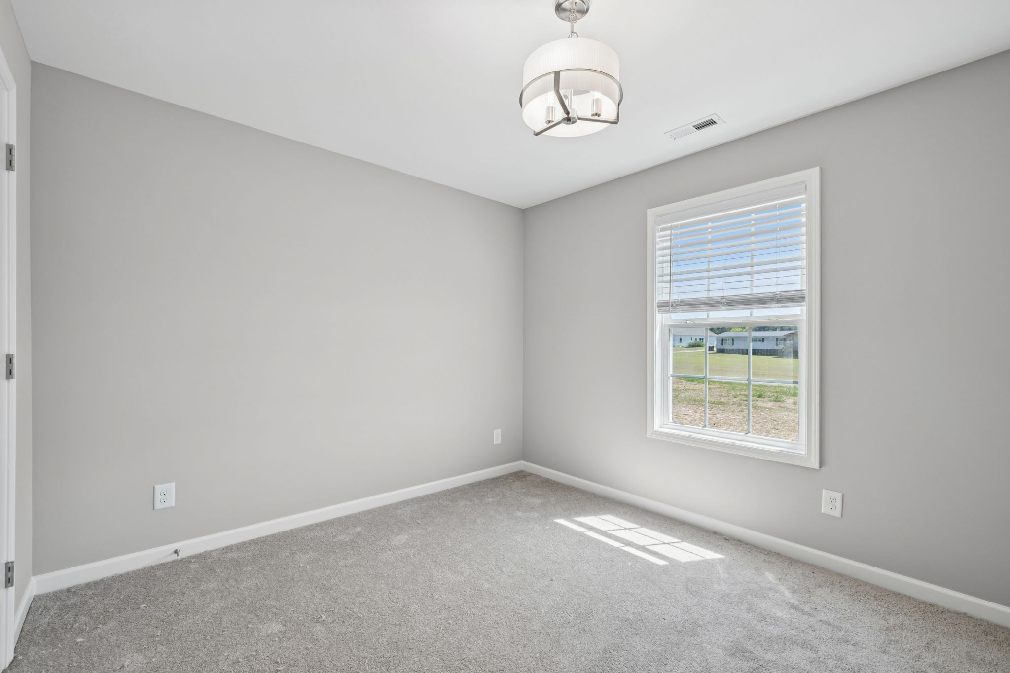 84 Old Brick Church Road Estill Springs, TN 37330 - Photo 31 of 37 an empty room with a window