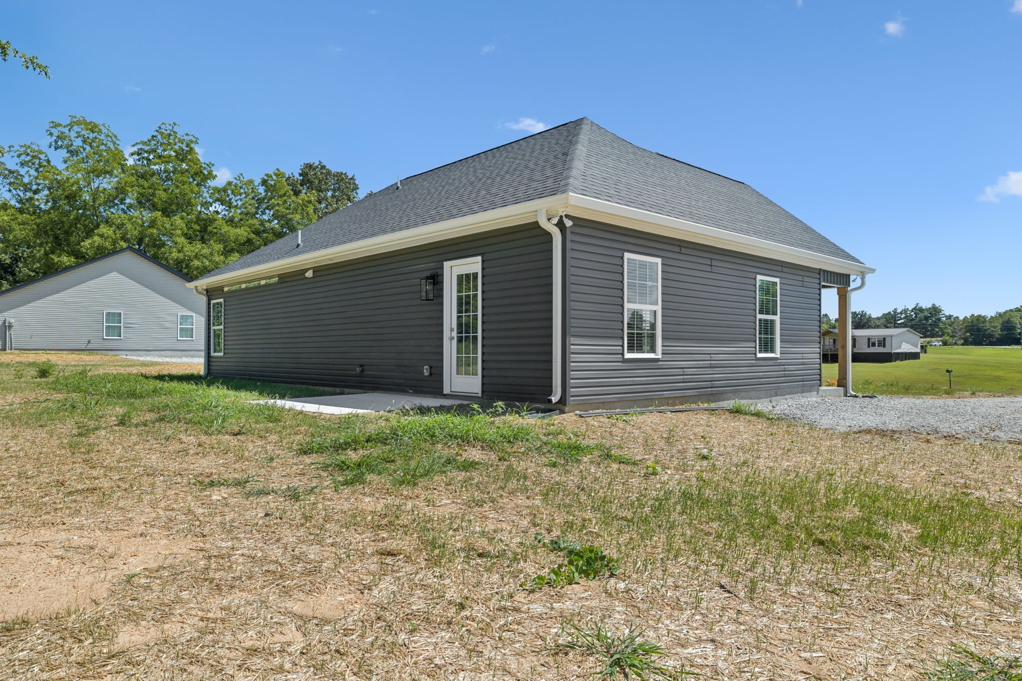 84 Old Brick Church Road Estill Springs, TN 37330 - Photo 33 of 37 a front view of a house with a yard and garage