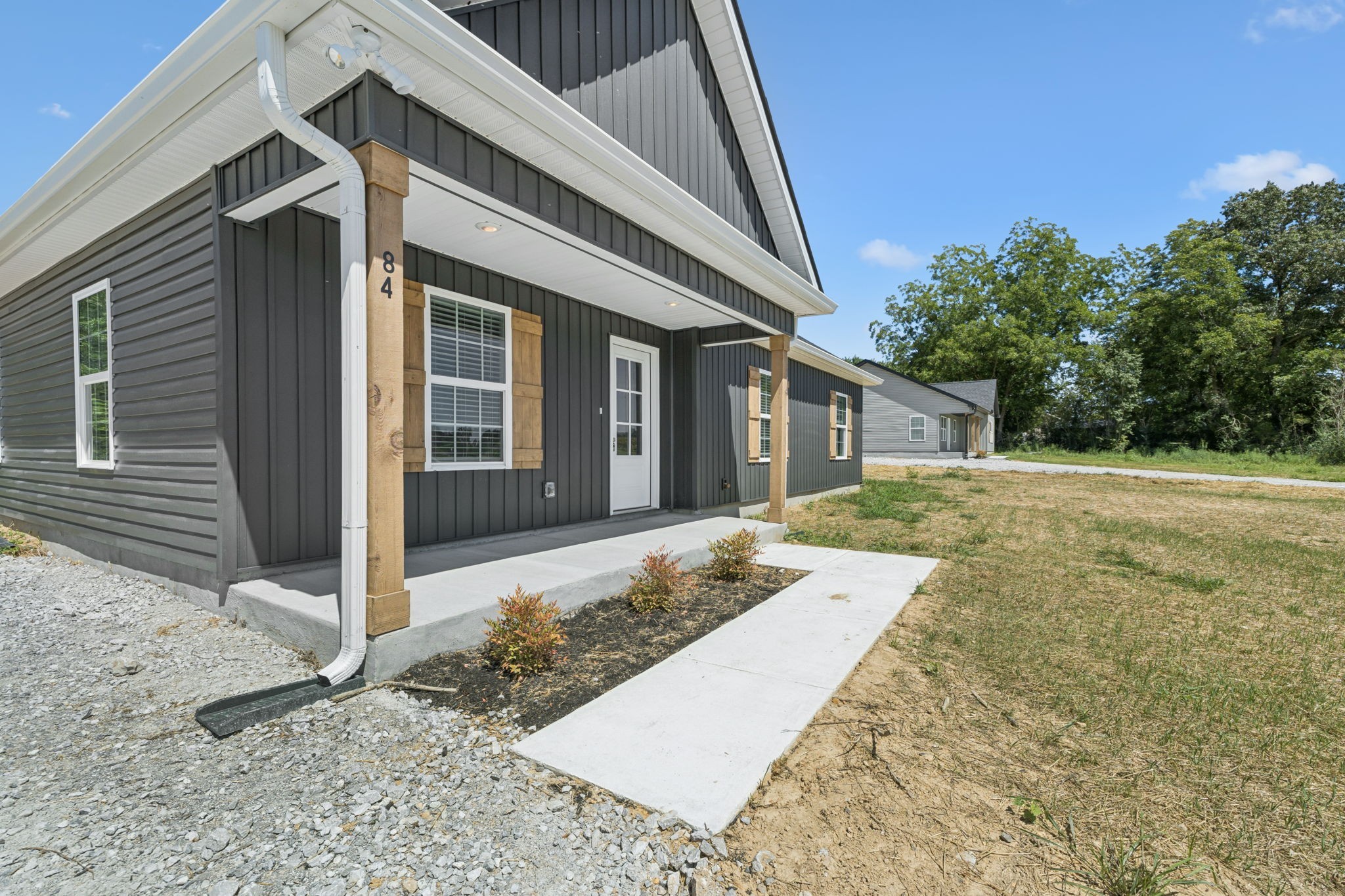 84 Old Brick Church Road Estill Springs, TN 37330 - Photo 5 of 37 a view of a house with backyard and trees