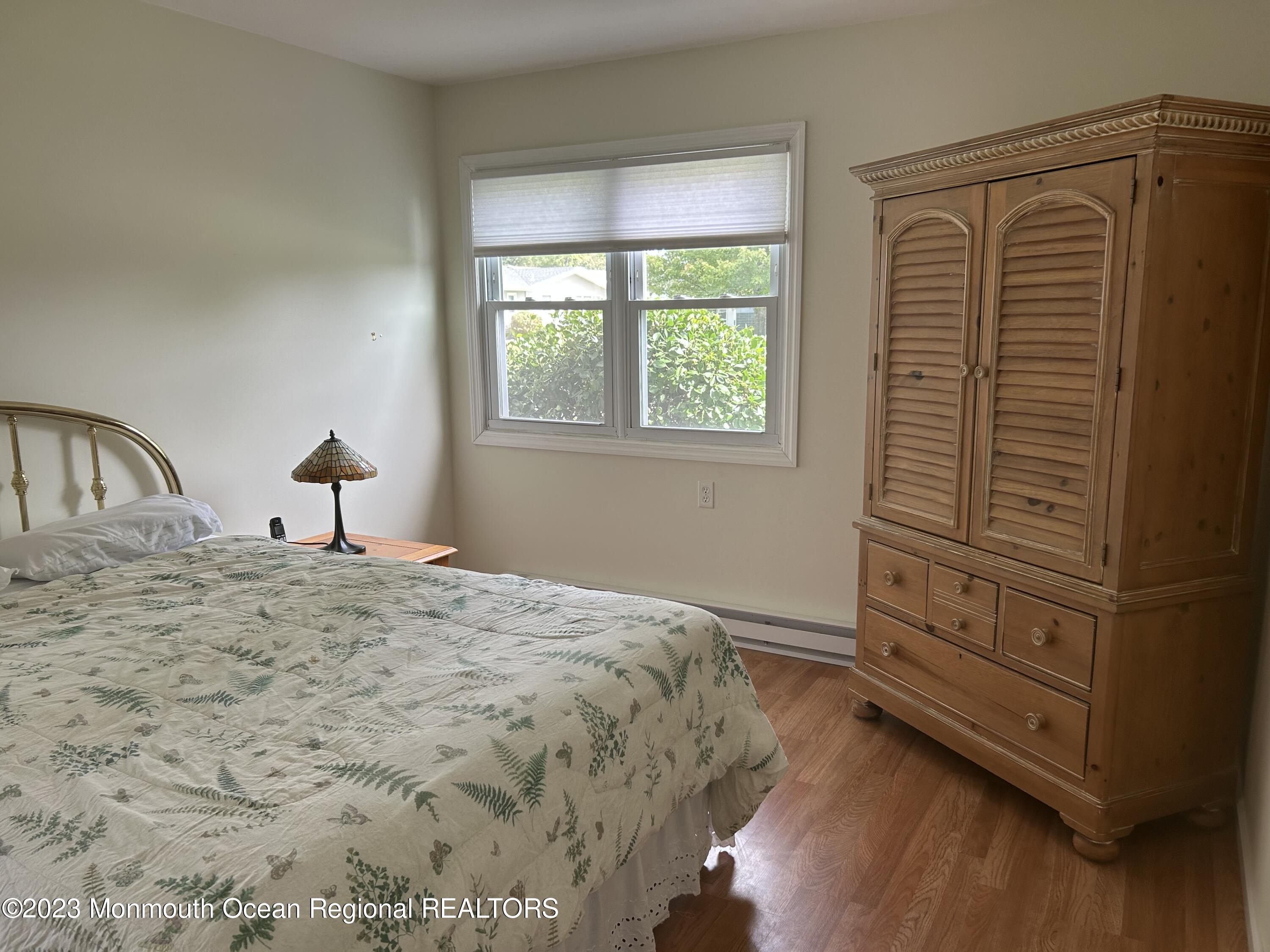 51 Markham Road Brick, NJ 08724 - Photo 16 of 31 a bedroom with a bed and a window