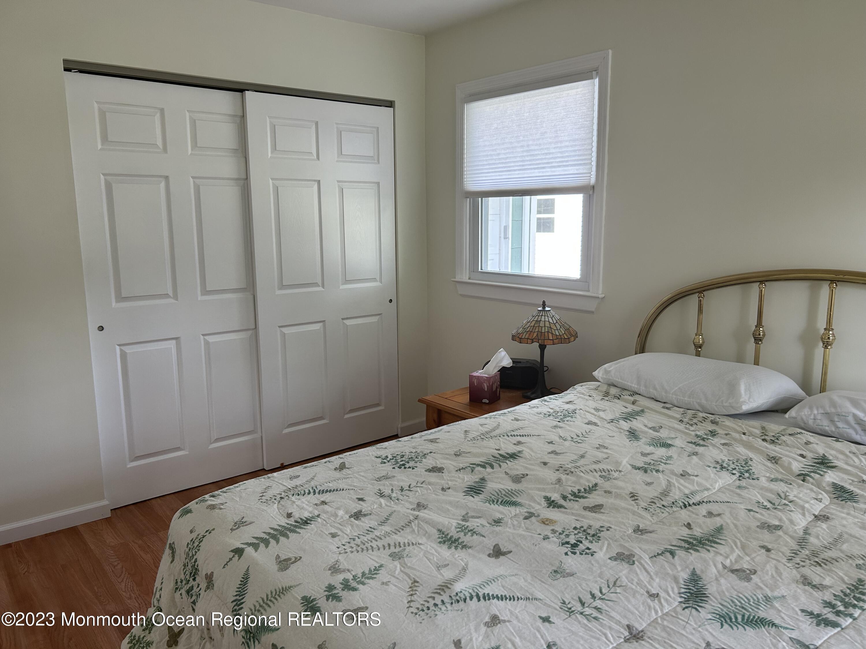51 Markham Road Brick, NJ 08724 - Photo 17 of 31 a bedroom with a bed and a window
