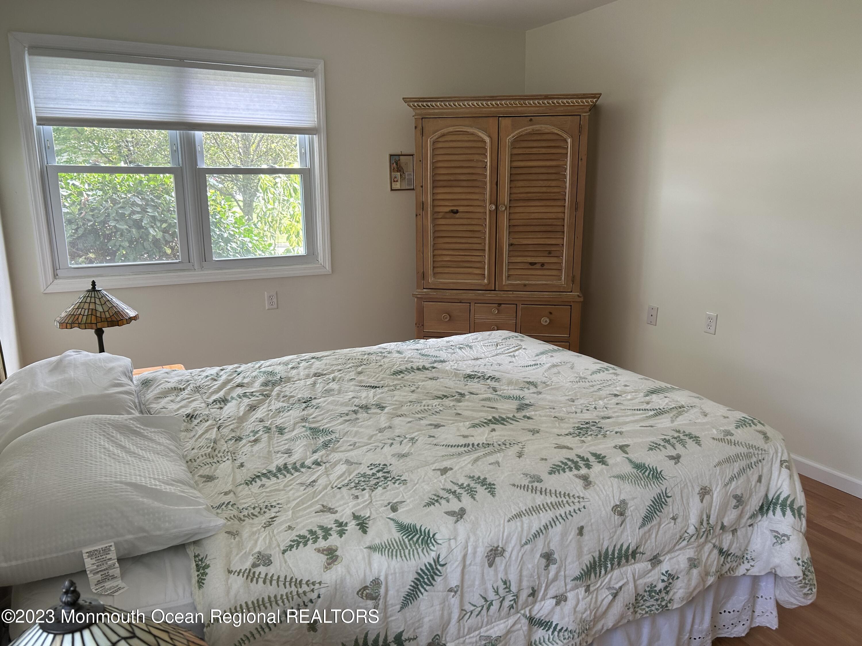 51 Markham Road Brick, NJ 08724 - Photo 18 of 31 a bedroom with a bed and a window