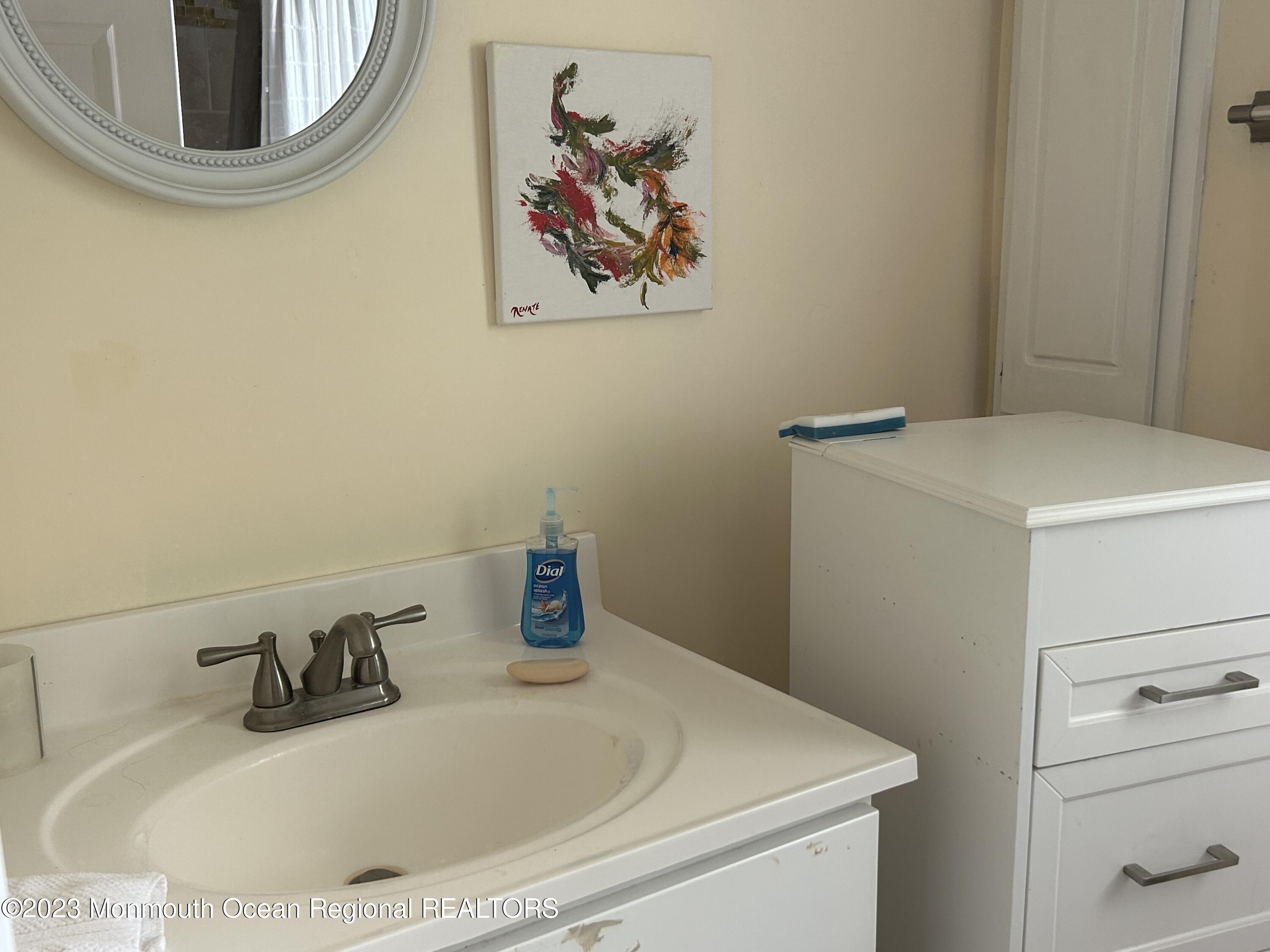 51 Markham Road Brick, NJ 08724 - Photo 21 of 31 a bathroom with a sink and a vanity