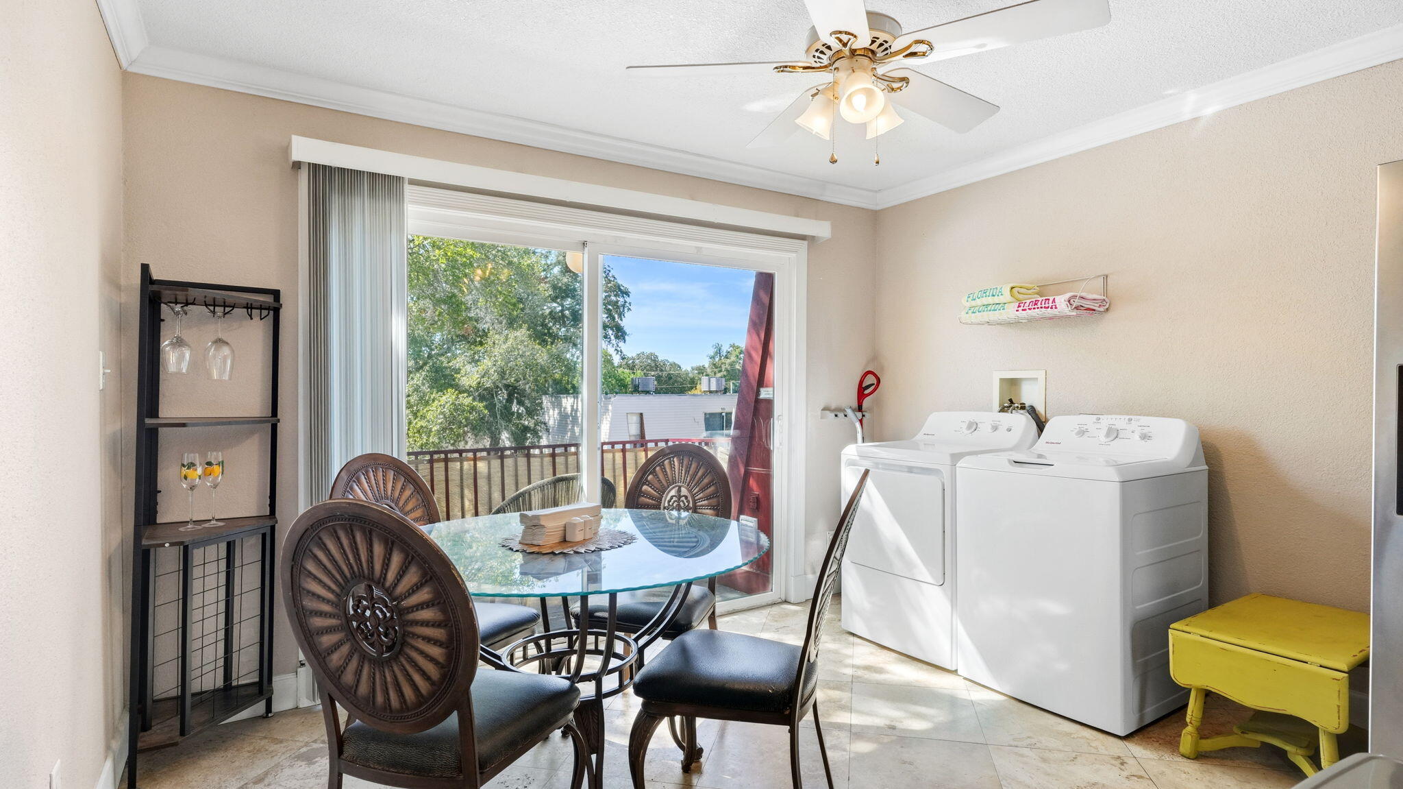 210 Pelham Road, Unit 215A Fort Walton Beach, FL 32547 - Photo 23 of 27 a dining room with furniture and window