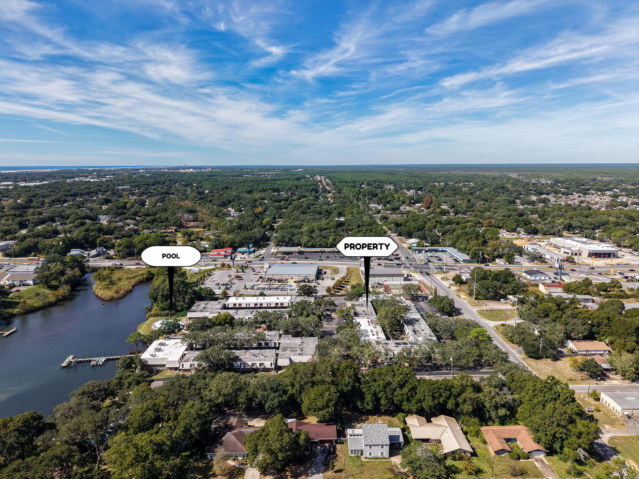 210 Pelham Road, Unit 215A Fort Walton Beach, FL 32547 - Photo 26 of 27 an aerial view of a city with lots of residential buildings