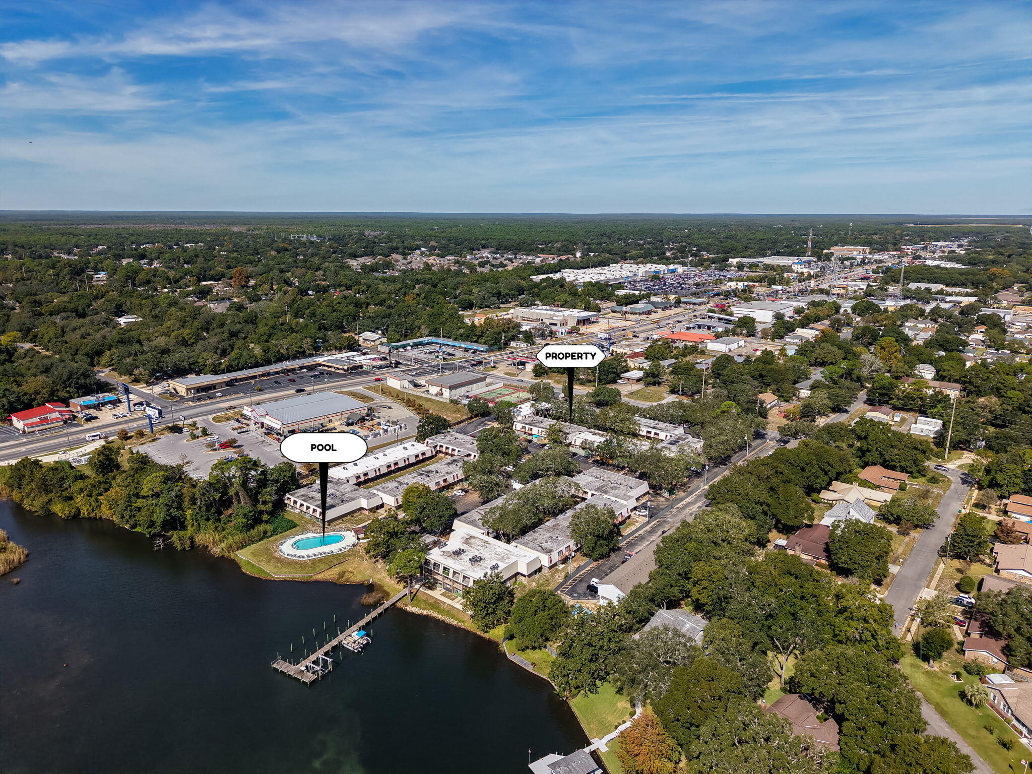 210 Pelham Road, Unit 215A Fort Walton Beach, FL 32547 - Photo 27 of 27 an aerial view of residential houses with outdoor space