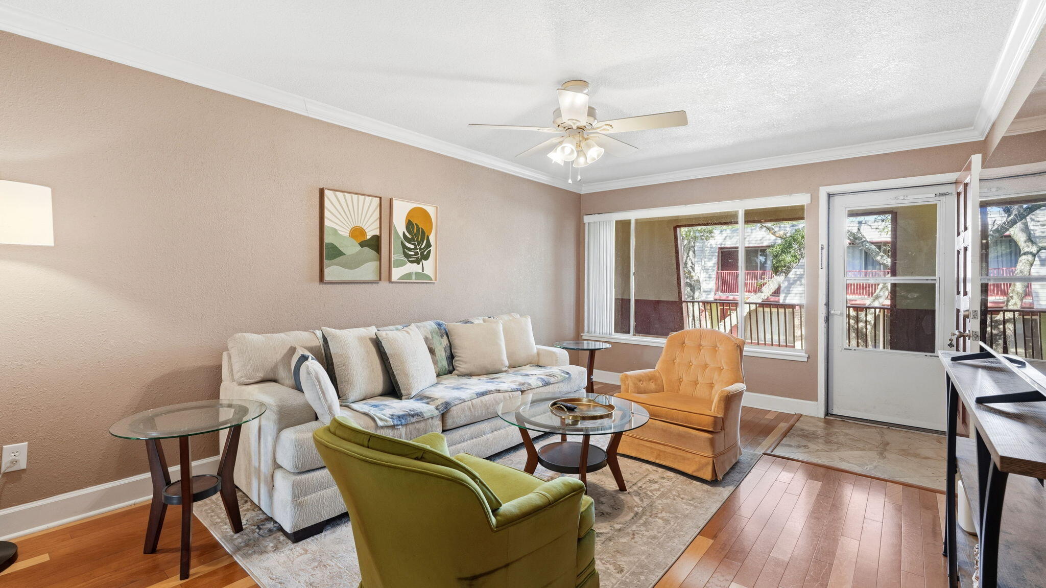 210 Pelham Road, Unit 215A Fort Walton Beach, FL 32547 - Photo 5 of 27 a living room with furniture and wooden floor