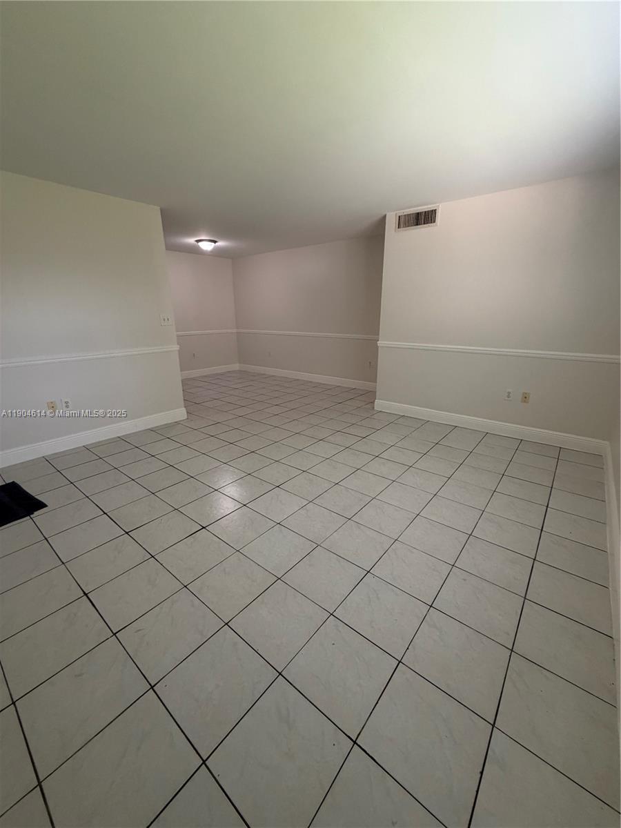 10370 Southwest 220th Street, Unit 118 Cutler Bay, FL 33190 - Photo 4 of 15 a view of a room and has window
