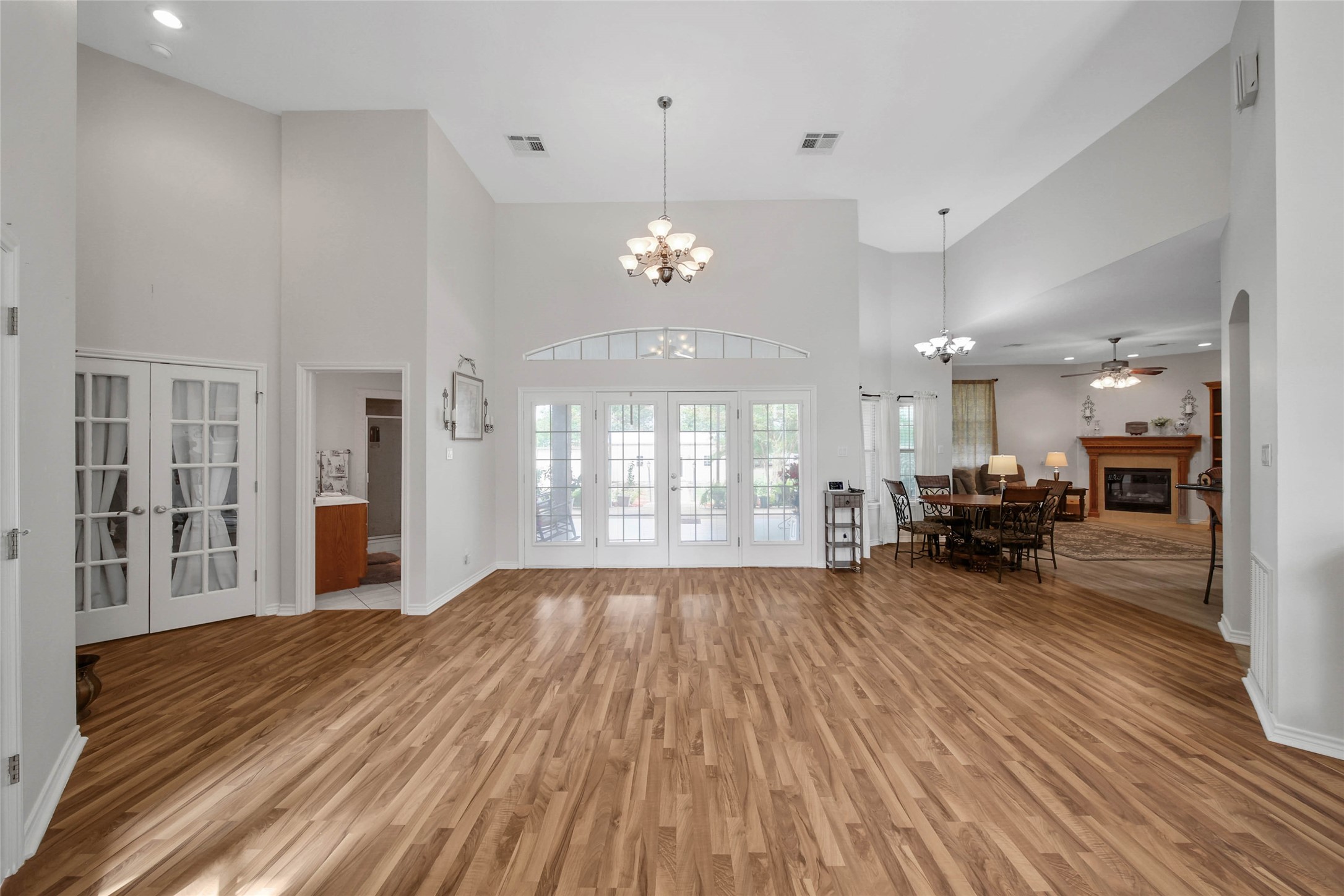 128 Duke Road Bedias, TX 77831 - Photo 11 of 50 a view of a livingroom with furniture wooden floor and a fireplace