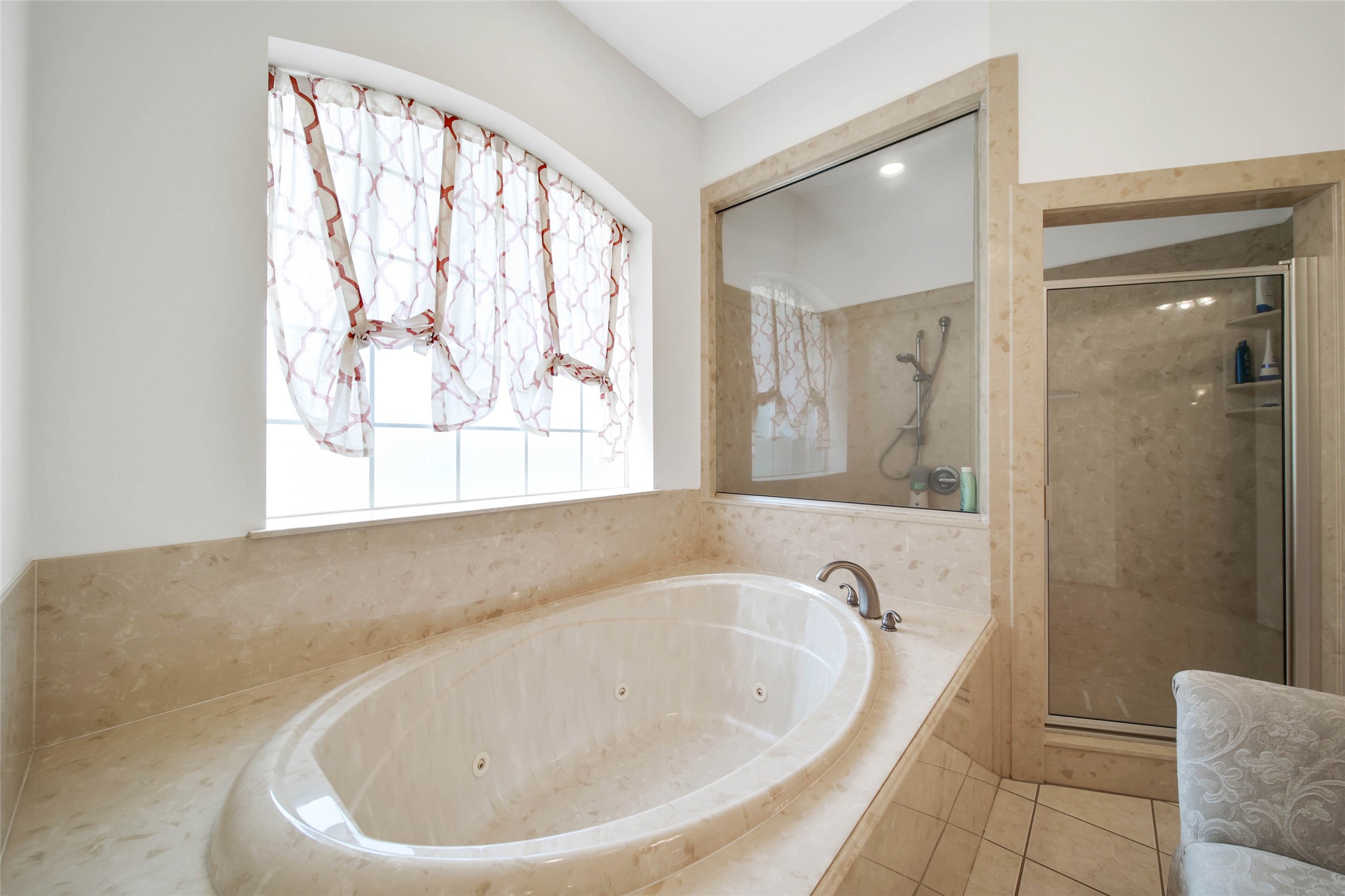 128 Duke Road Bedias, TX 77831 - Photo 21 of 50 a white bath tub sitting in a bathroom