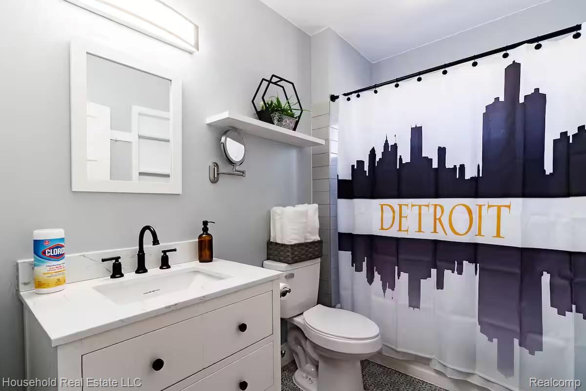 4446 Commonwealth Street Detroit, MI 48208 - Photo 9 of 28 Bathroom featuring vanity and toilet