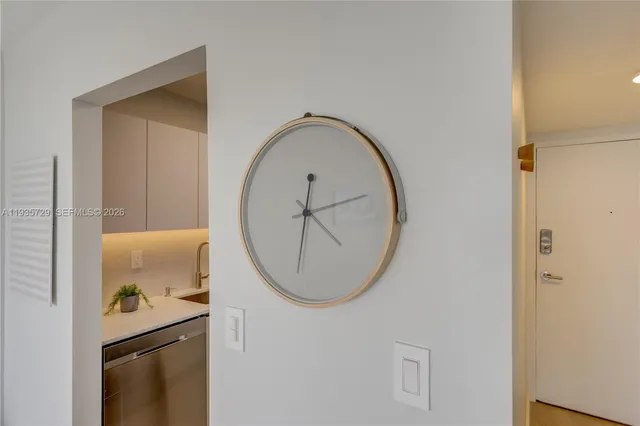 a bathroom with a sink and mirror