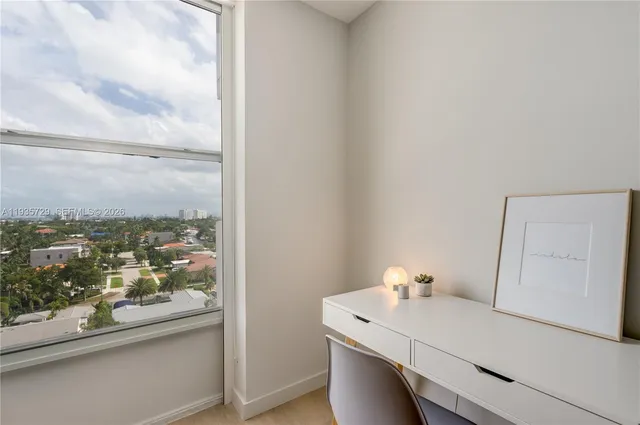 a room with a table and chairs