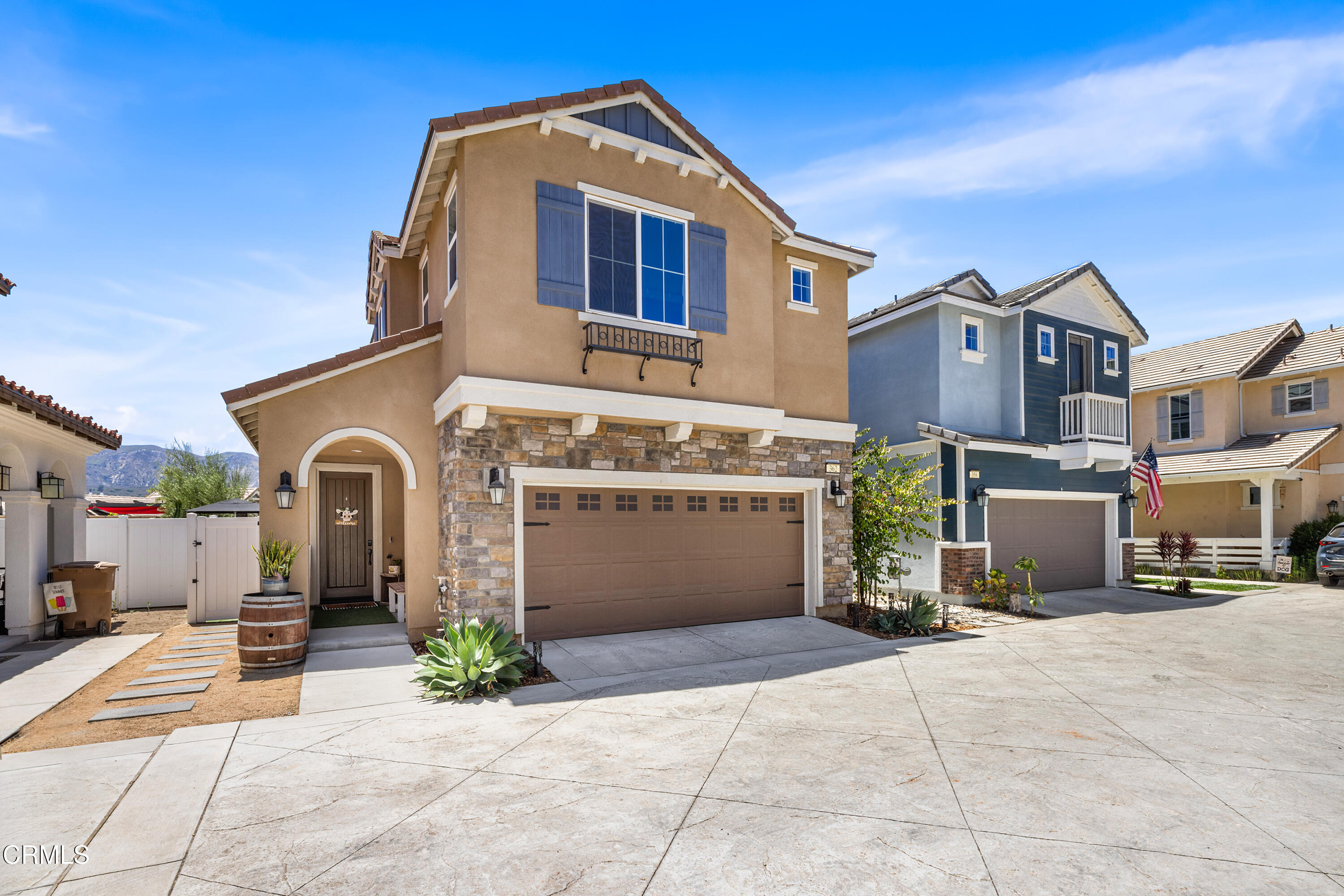a front view of a house with yard