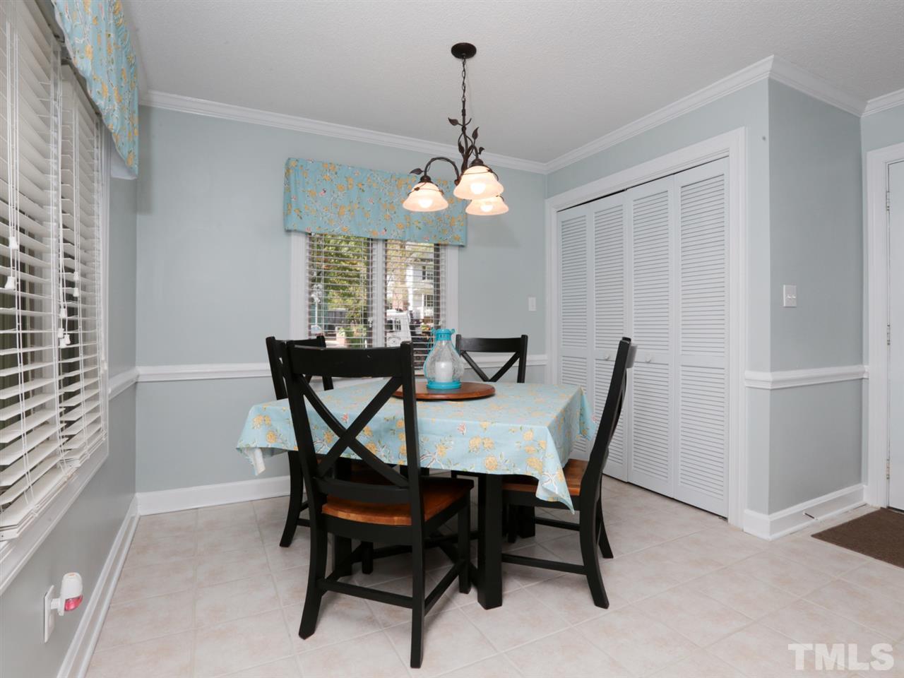 7309 Phellos Court Raleigh, NC 27615 - Photo 8 of 19 a dining room with furniture and window