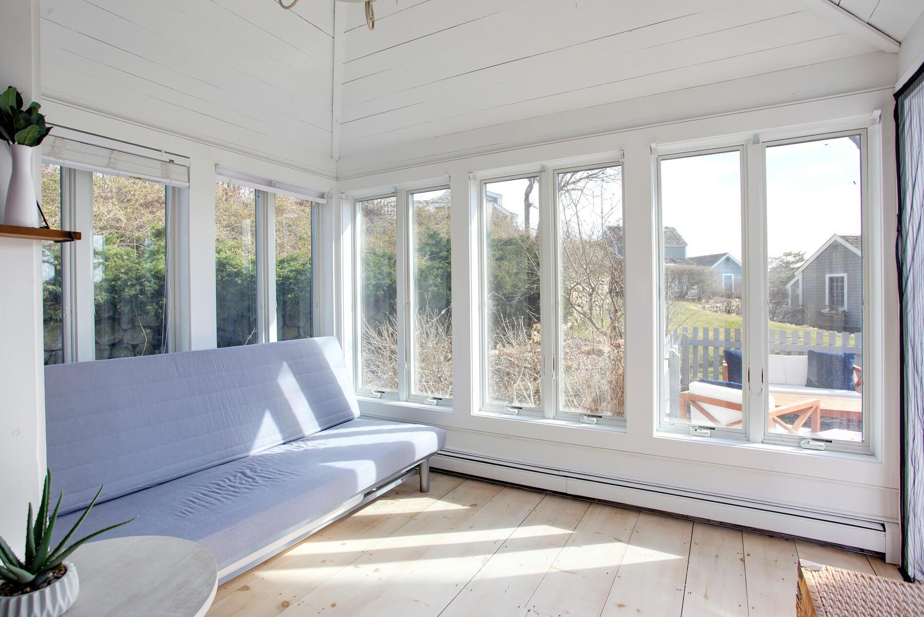 7 Flying Cloud Circle Mashpee, MA 02649 - Photo 11 of 23 a living room with furniture and floor to ceiling windows